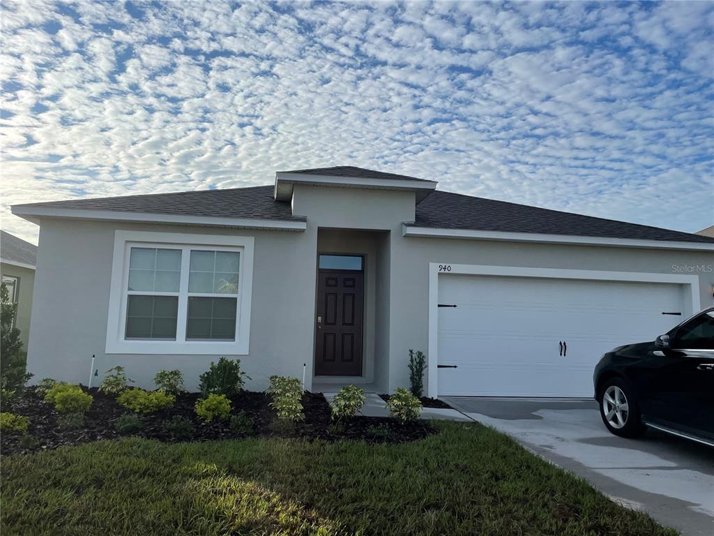 a car parked in front of a house