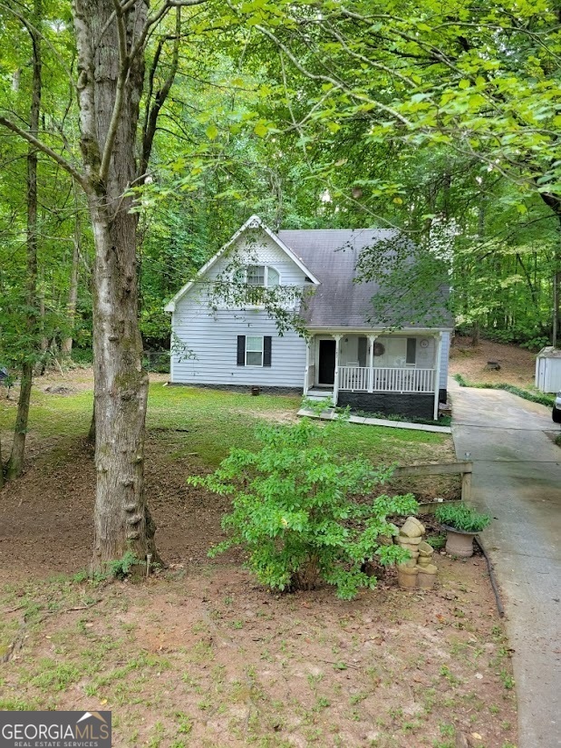 front view of a house with a yard