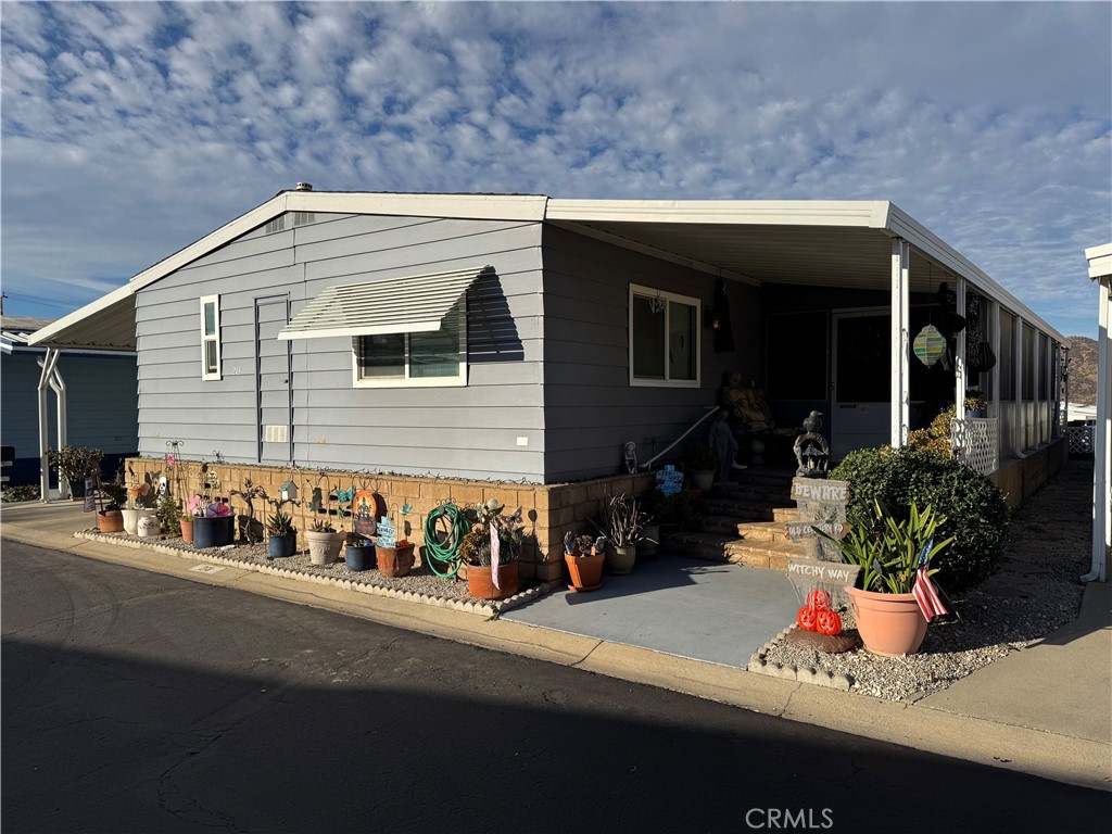 a view of the house with outdoor space