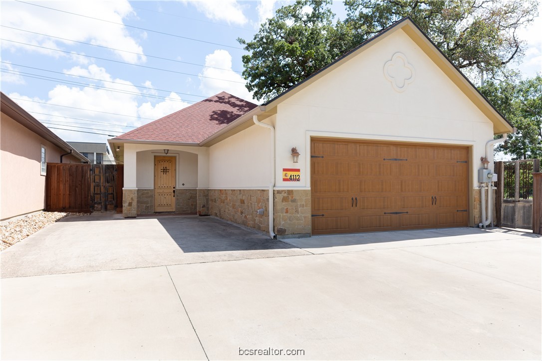 a view of a house with a garage