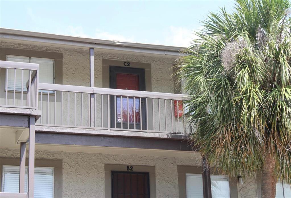 a view of a house with a balcony