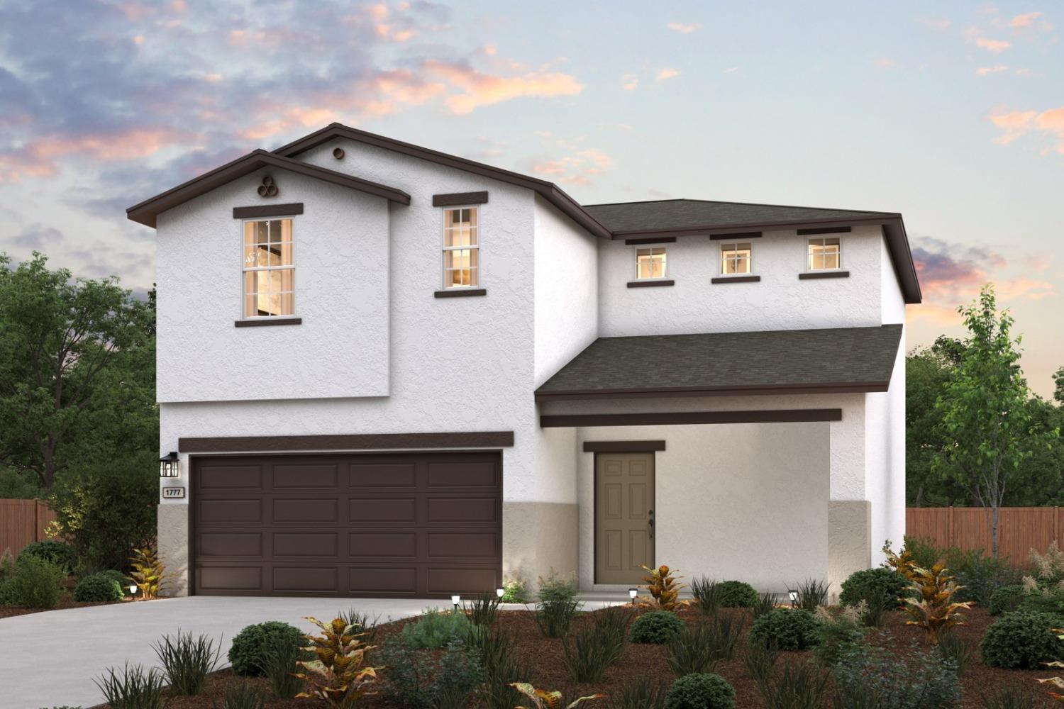 a front view of a house with a garage