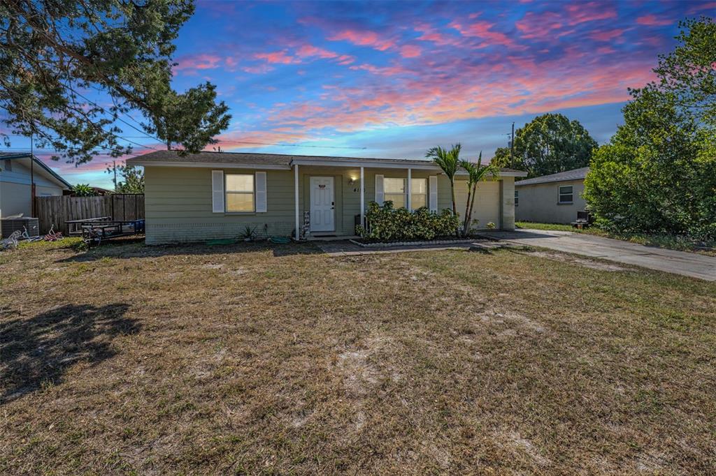 front view of a house with a yard