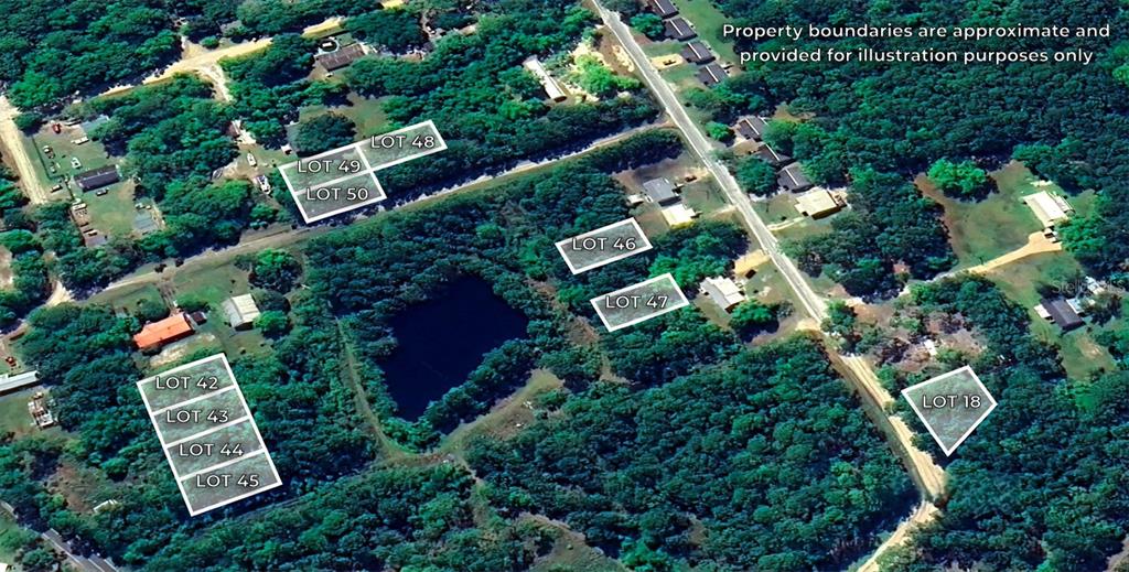 an aerial view of house with yard