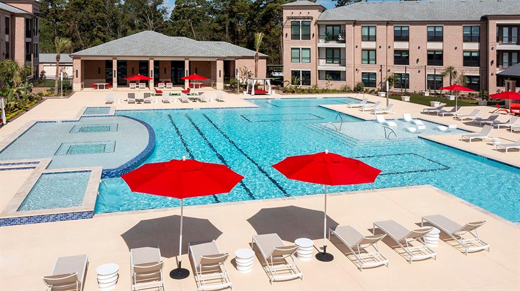 Resort style pool with pocket lounge areas