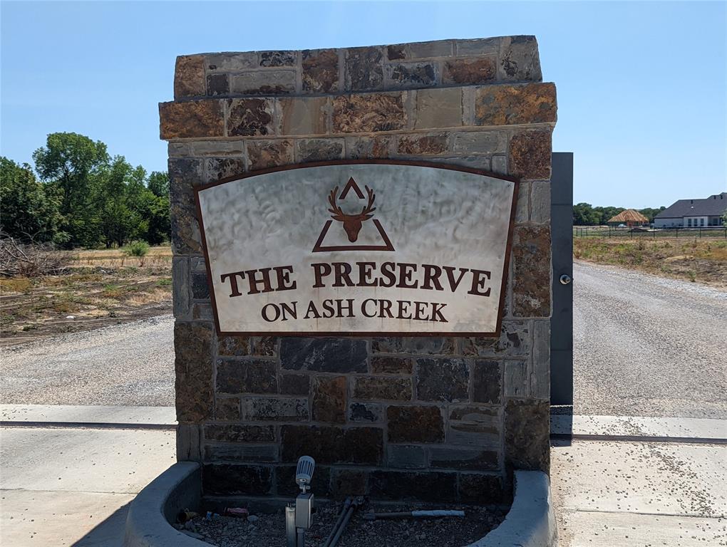 a view of outdoor space with sign board