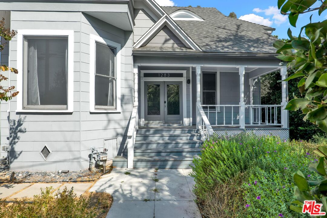 a view of house with a outdoor space