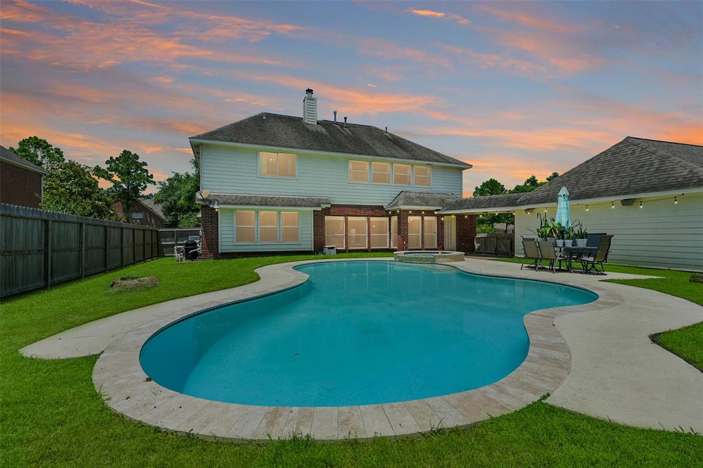 a view of outdoor space yard swimming pool and porch