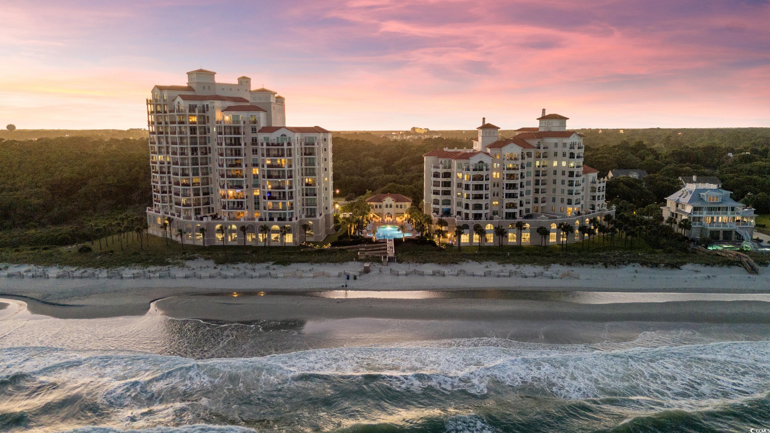 Outdoor building at dusk with a water view