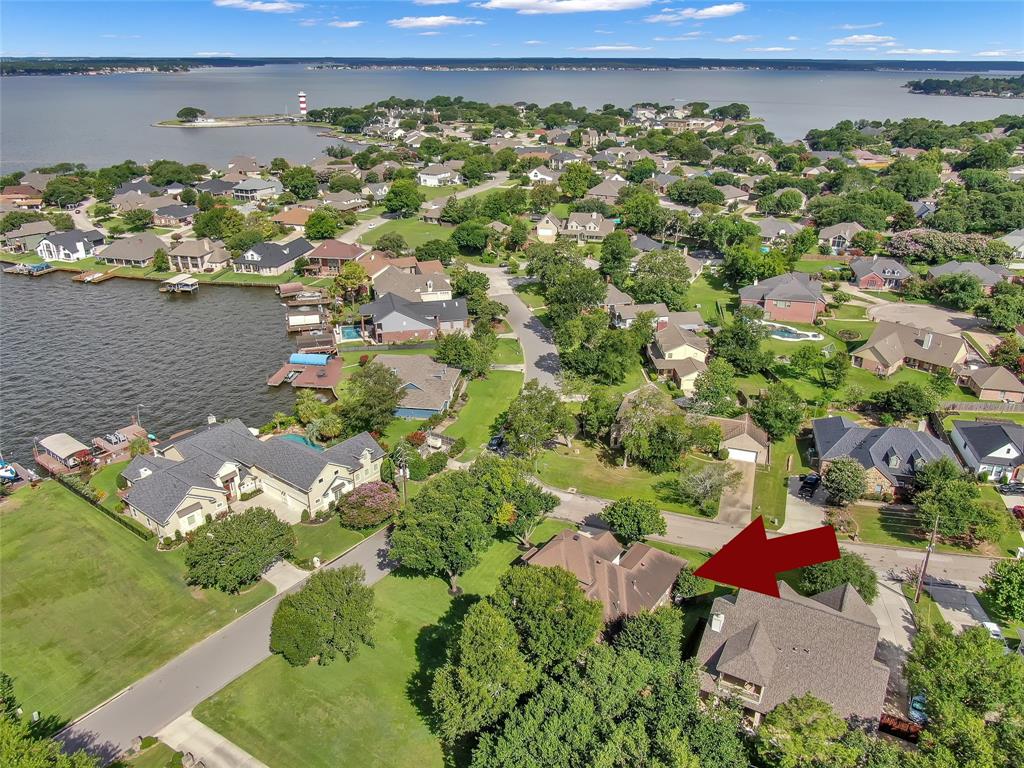 view of a lake with houses