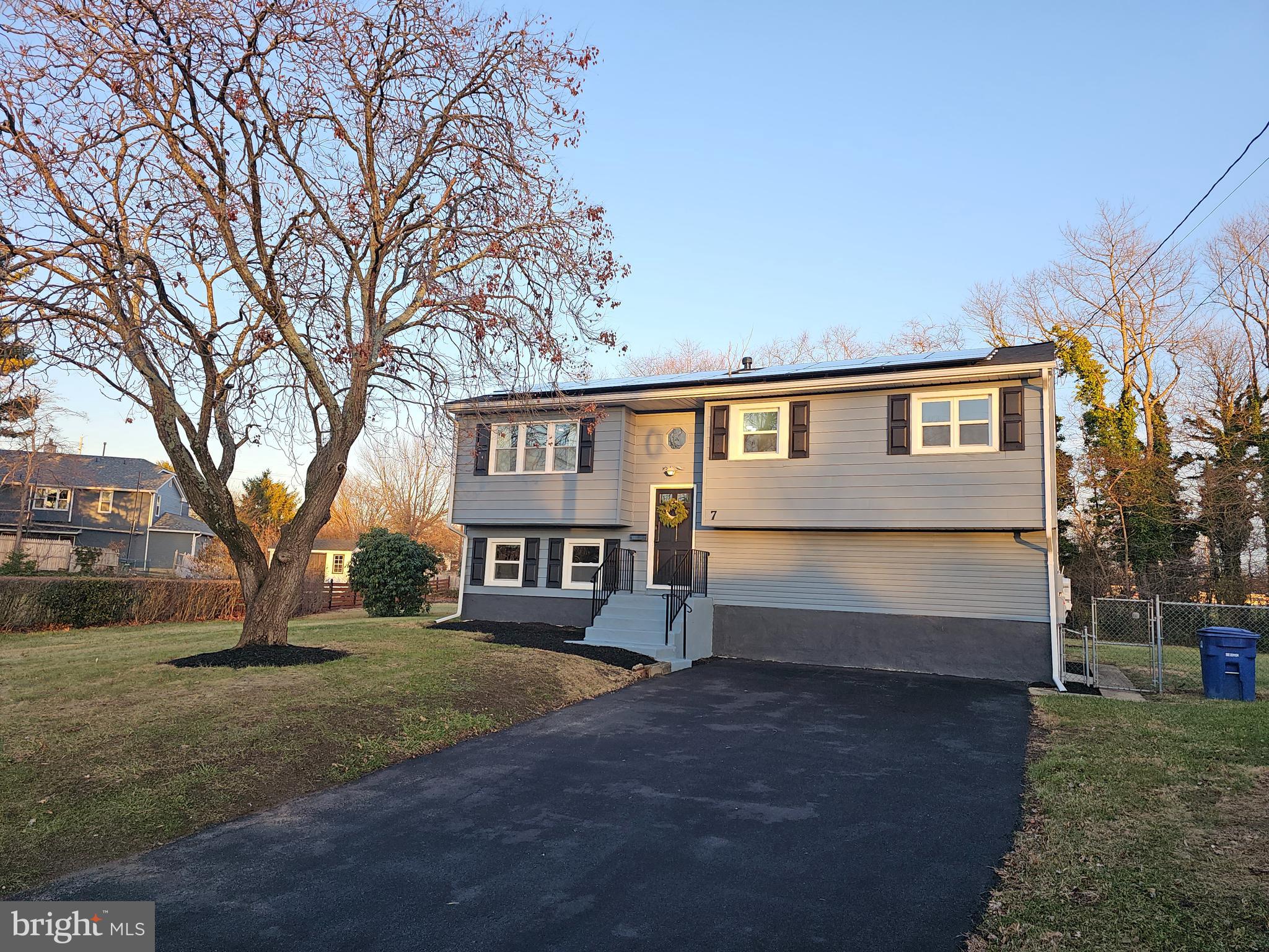 a house view with a garden space