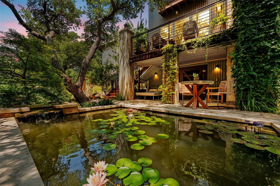 a view of a swimming pool with a patio