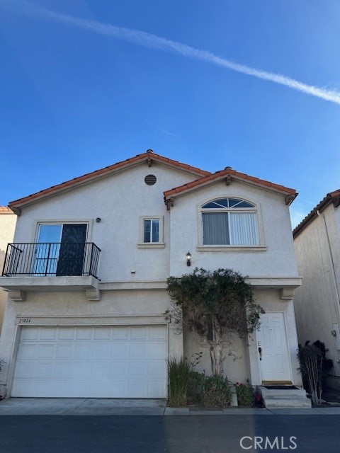 a view of a house with garage