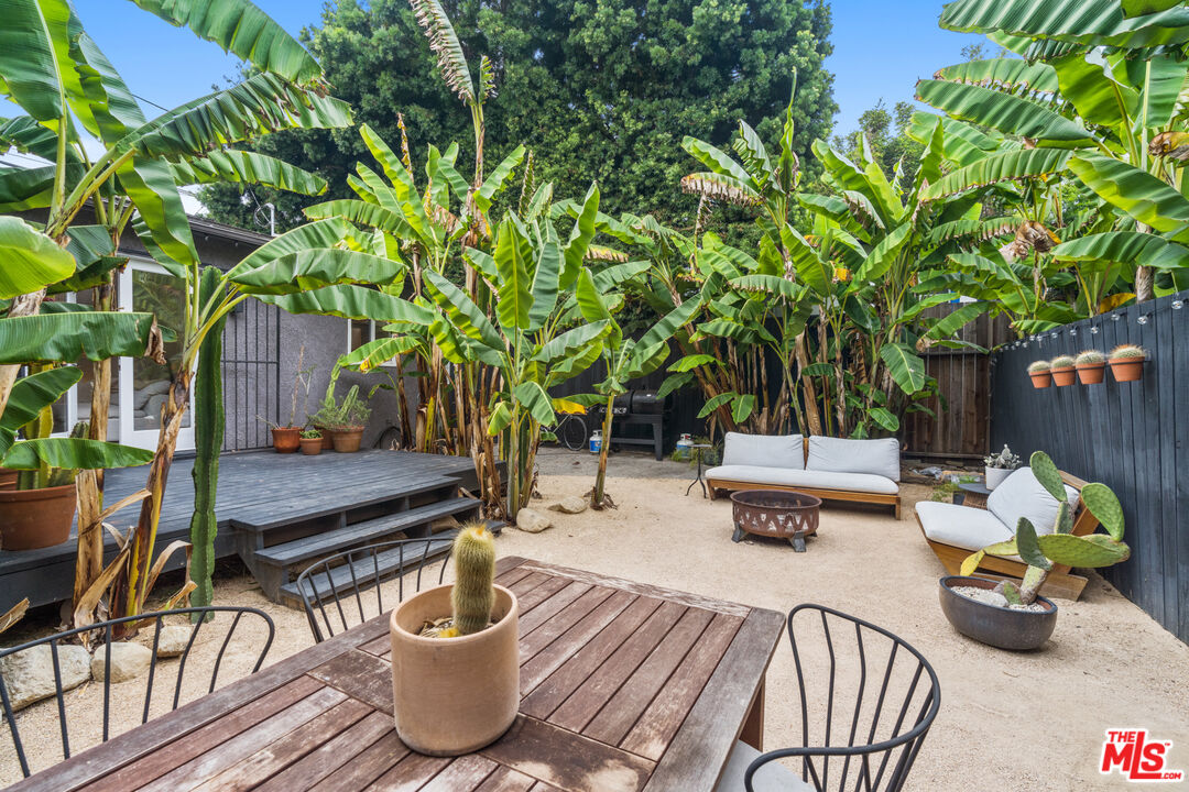 a backyard of a house with seating space