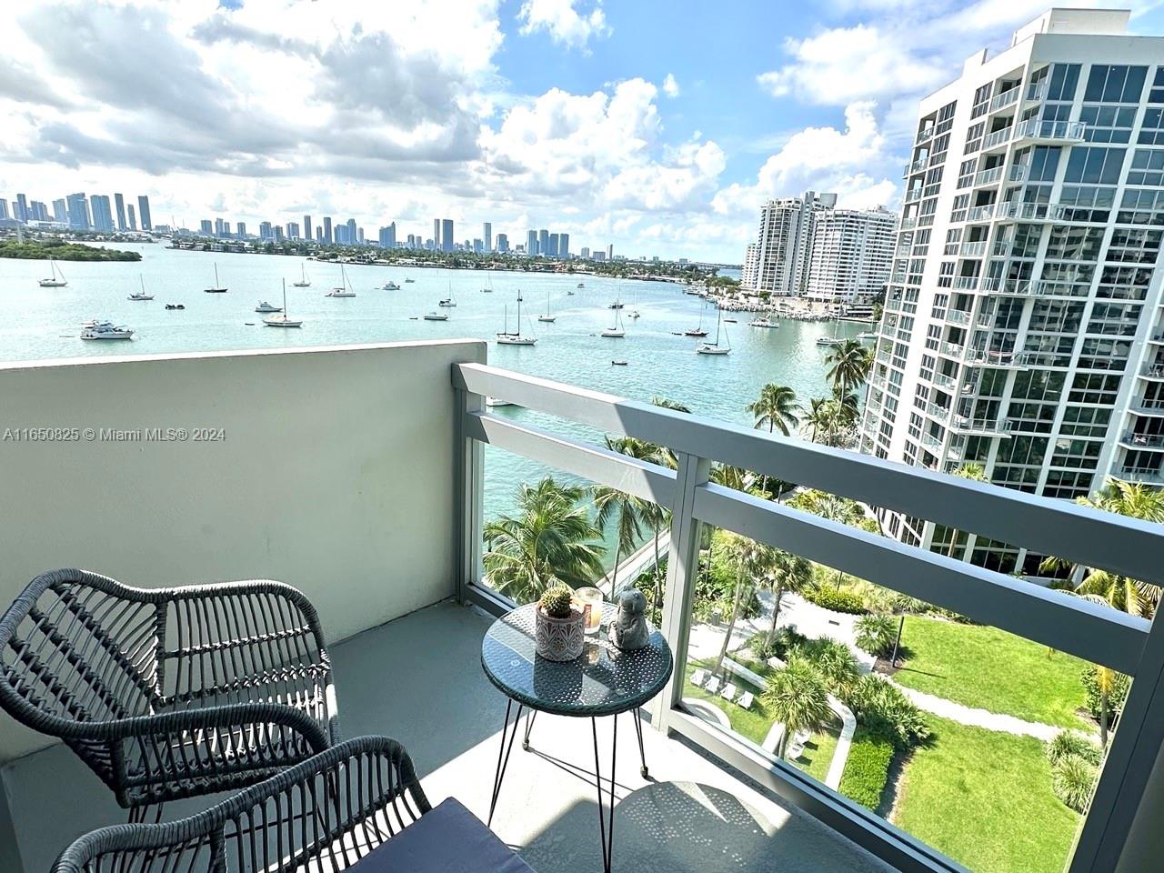 a view of a balcony with furniture