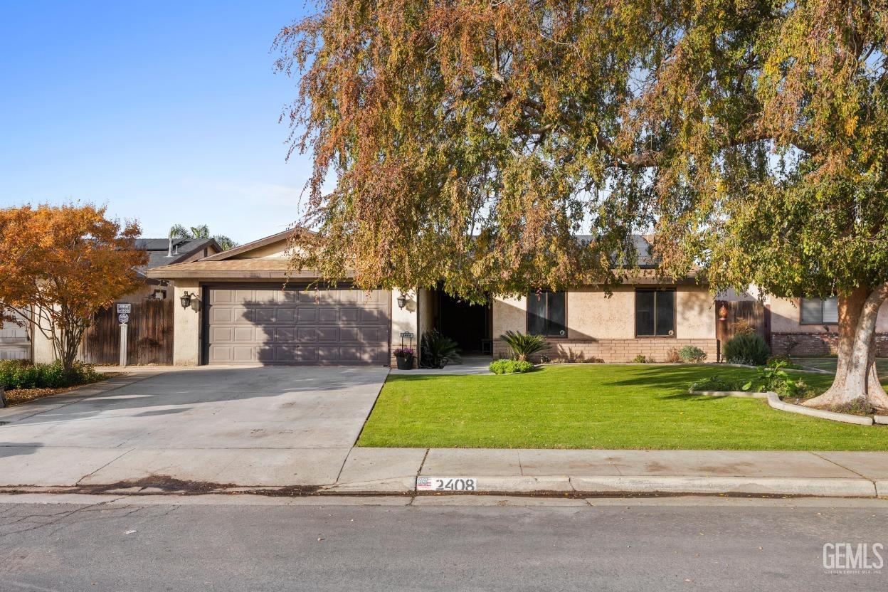 a house with a tree in front of it