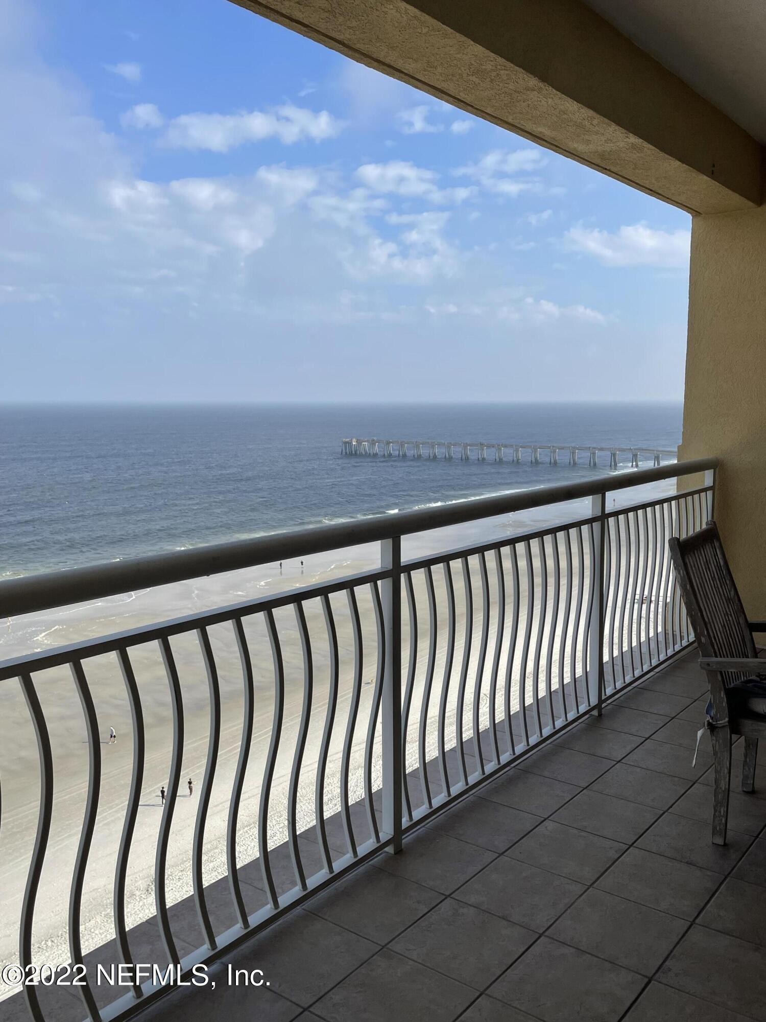 a balcony with an outdoor view