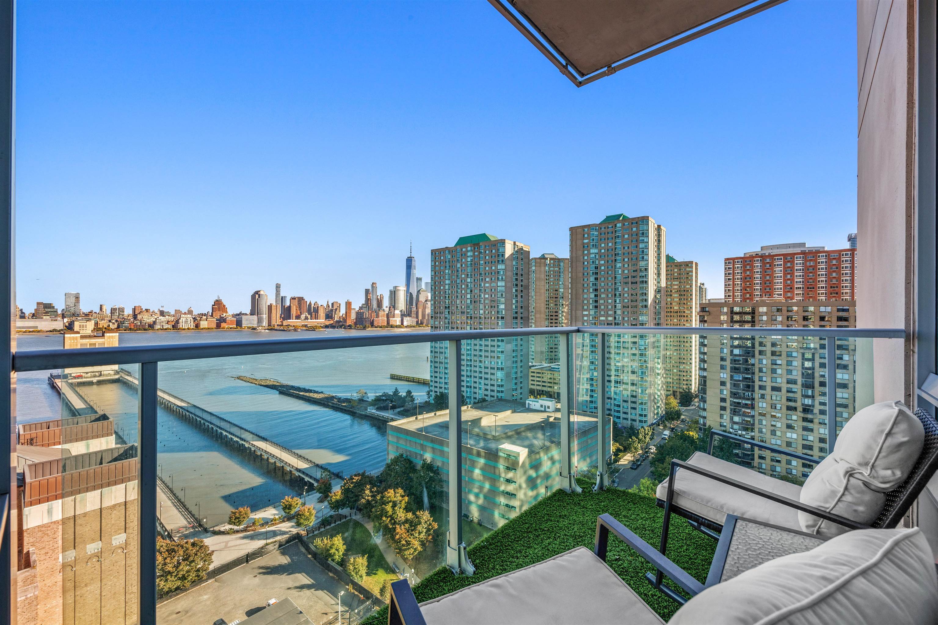 a view of a balcony with city view