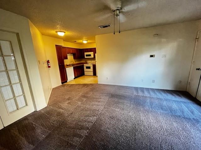 a view of a livingroom with a furniture