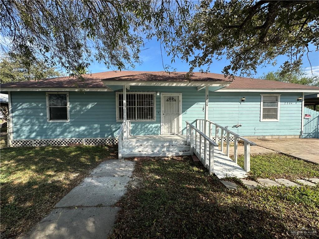 View of front of home featuring a front yard