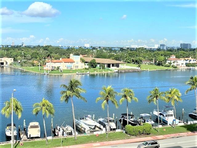 a view of a lake with a houses