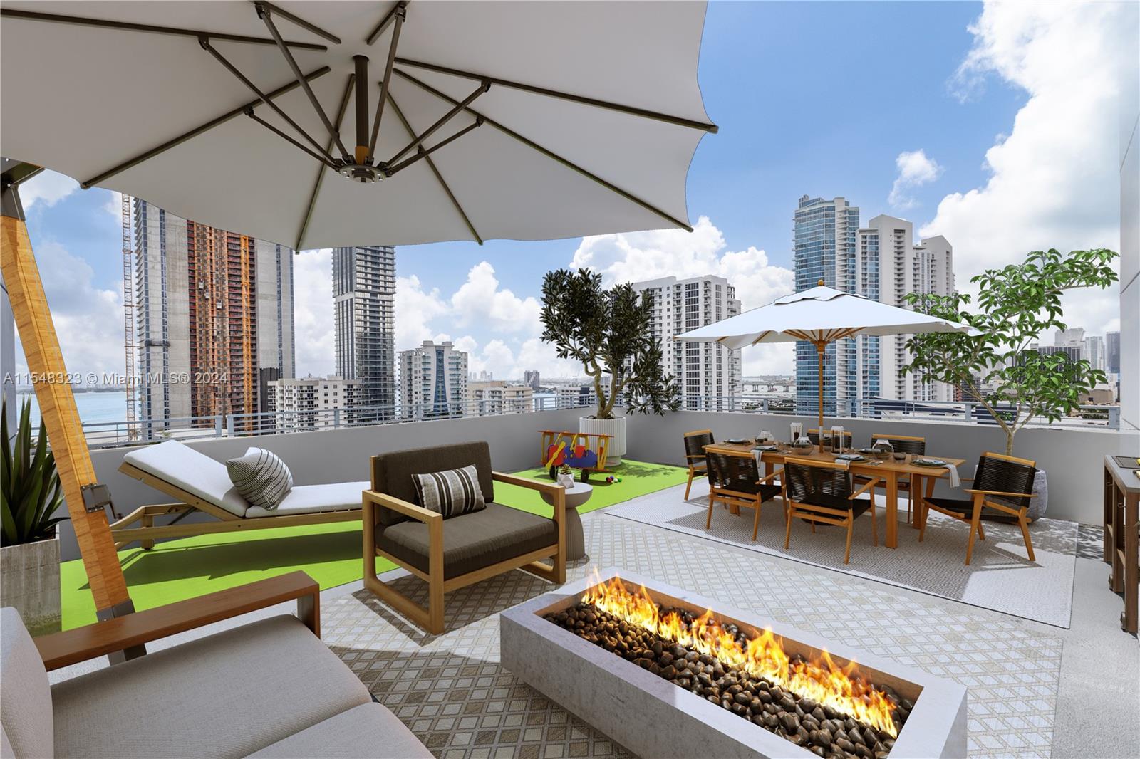 a living room with patio furniture and a potted plant