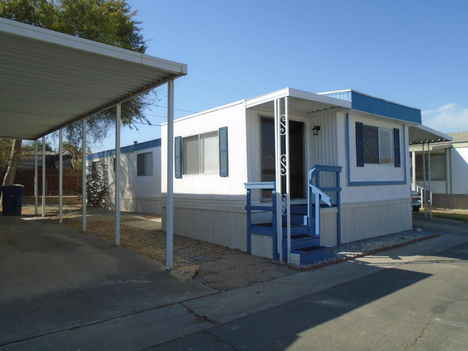 a front view of a house with a garage