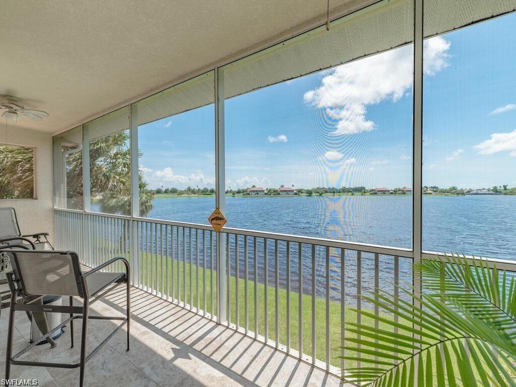 a view of a balcony with wooden floor