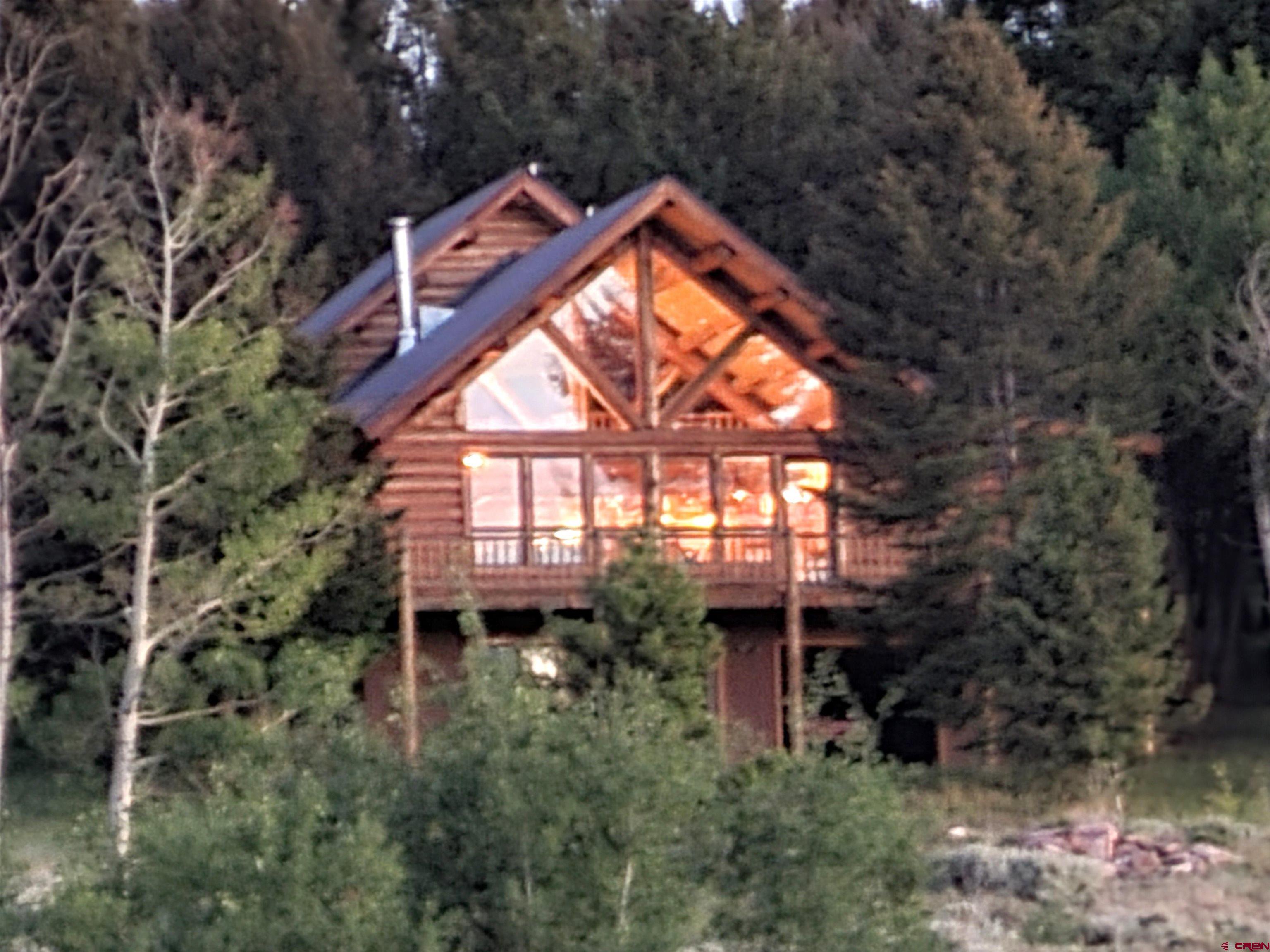 front view of a house with a small garden