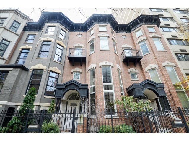 a front view of a multi story residential apartment building