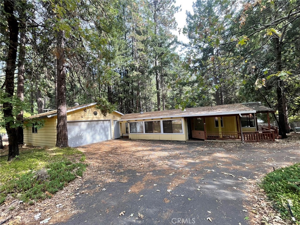 a front view of a house with yard