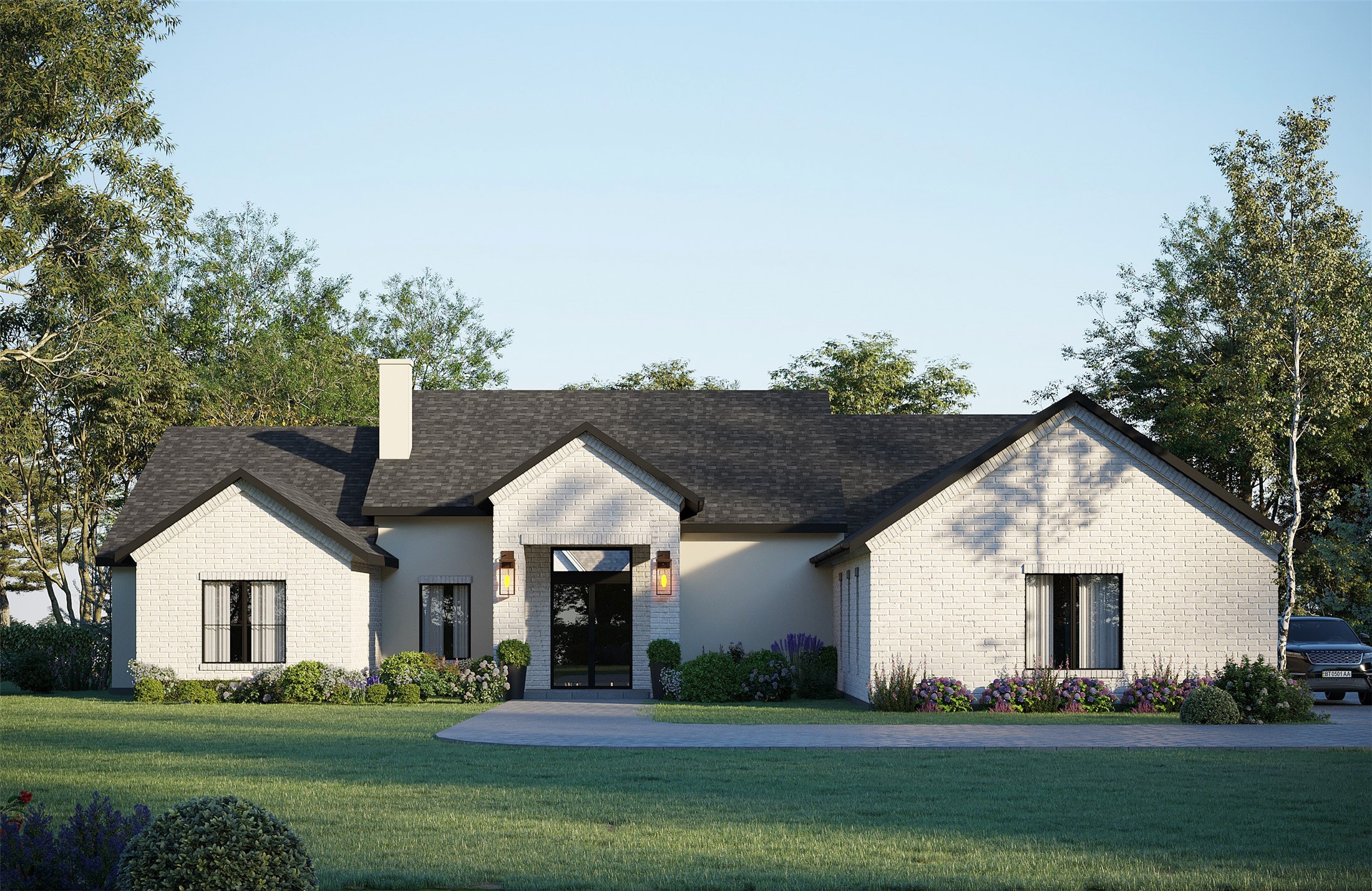 a front view of a house with a garden