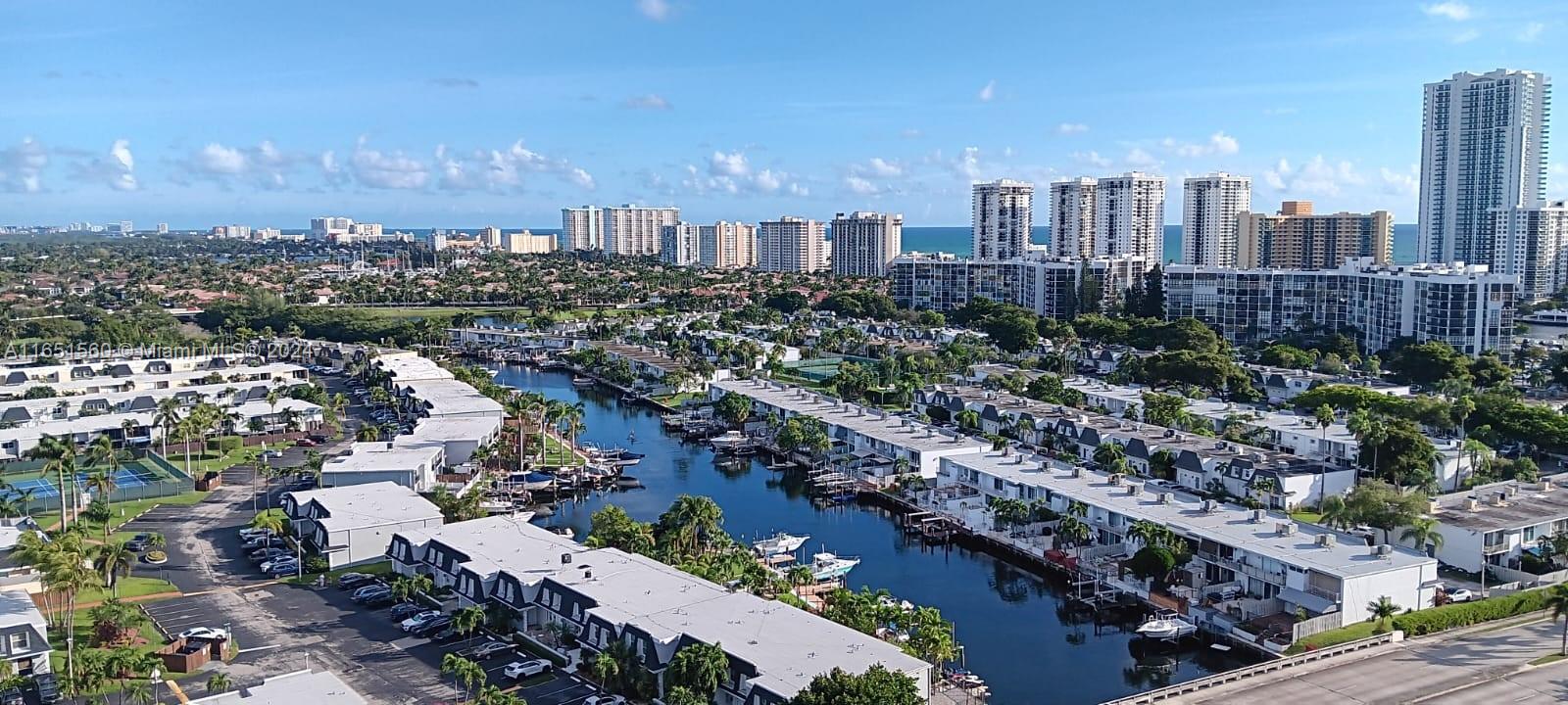 a view of a city with tall buildings