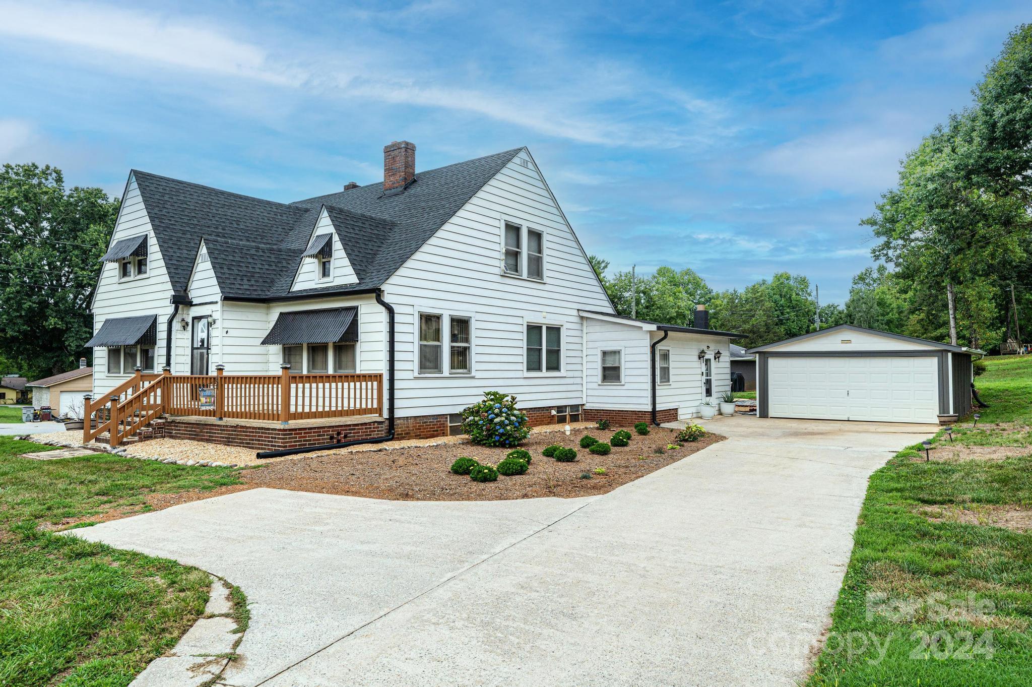 front view of a house with a patio