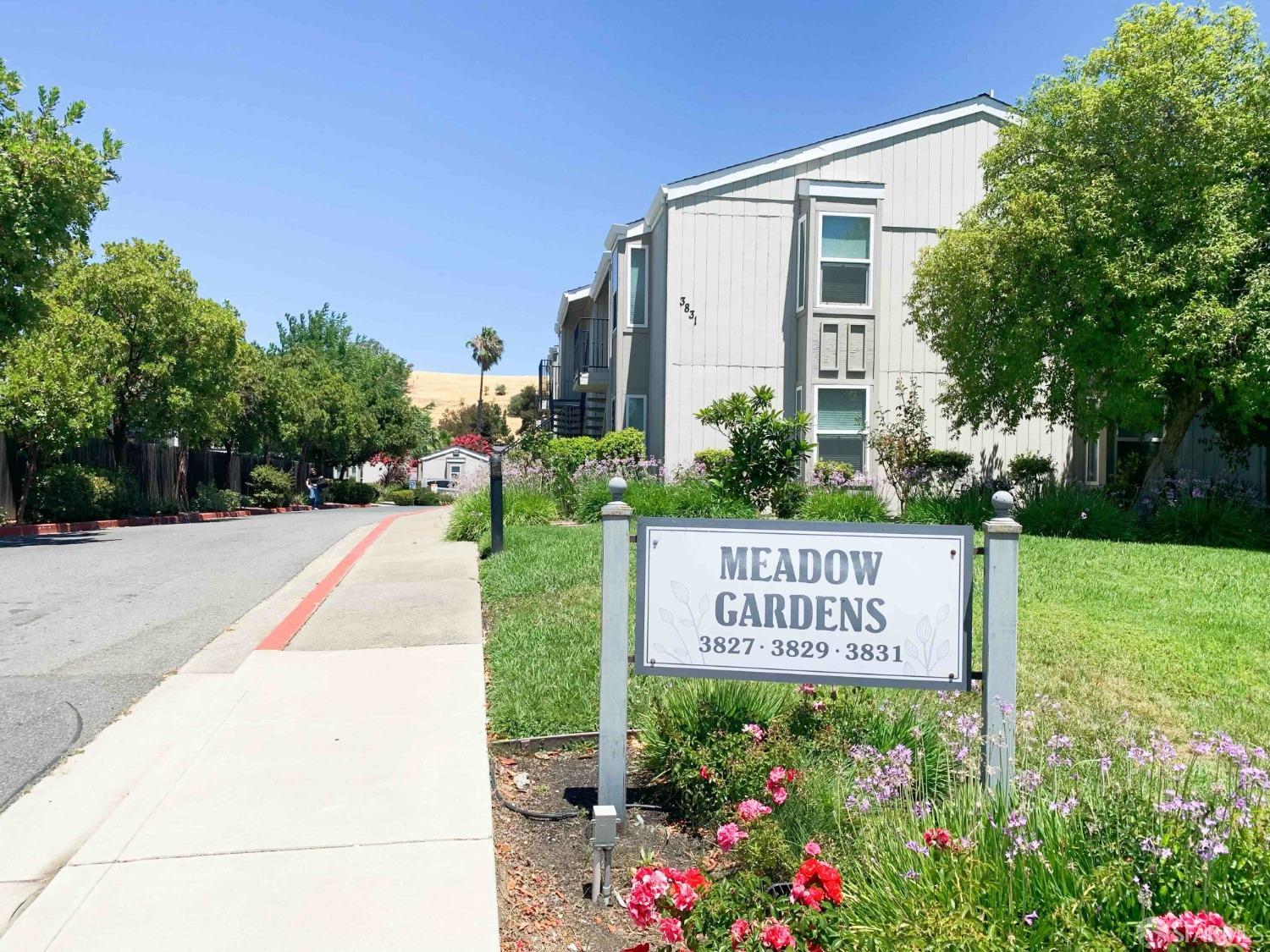 a view of a sign in front of a house