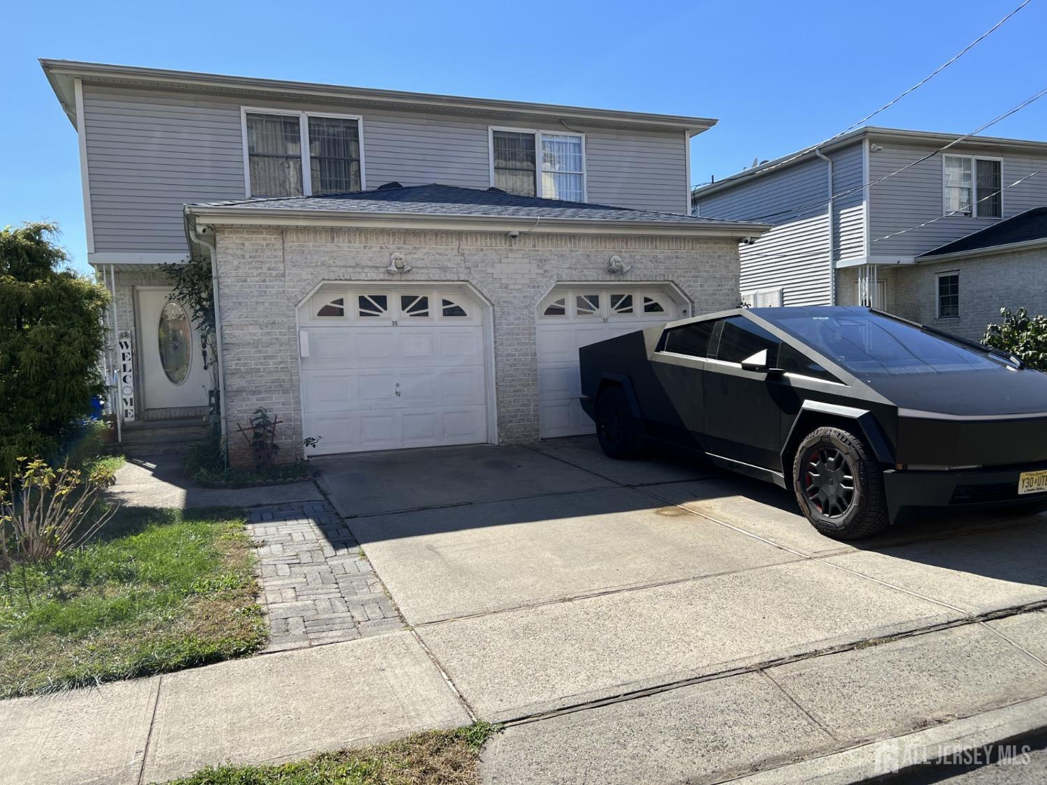 a car parked in front of a house