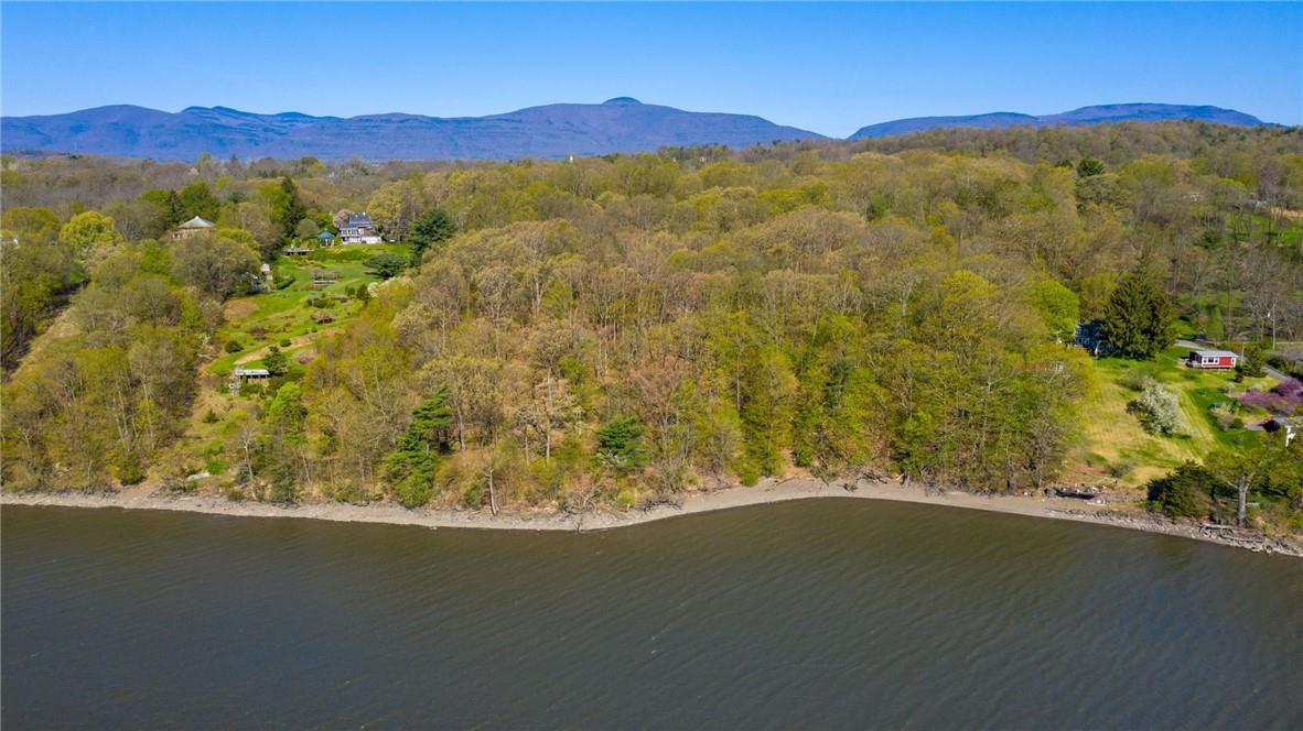 Bird's eye view with a water and mountain view