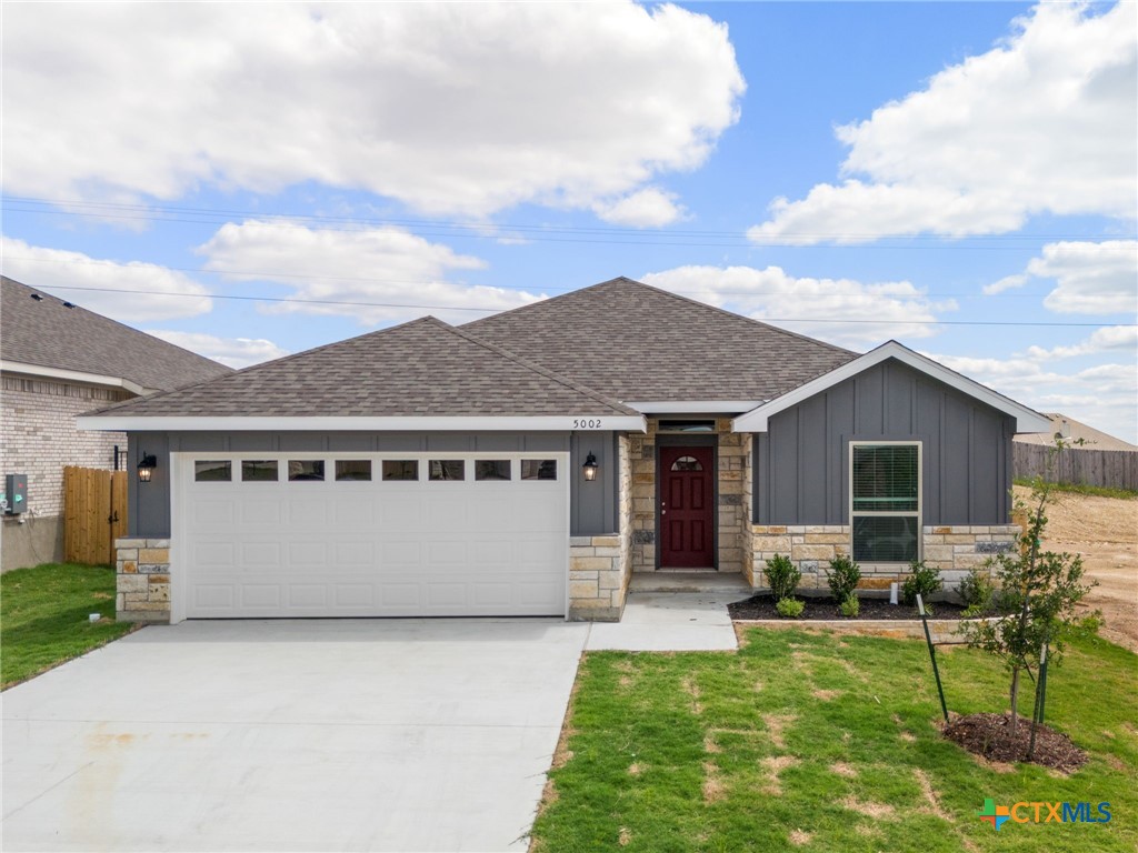 front view of house with a yard