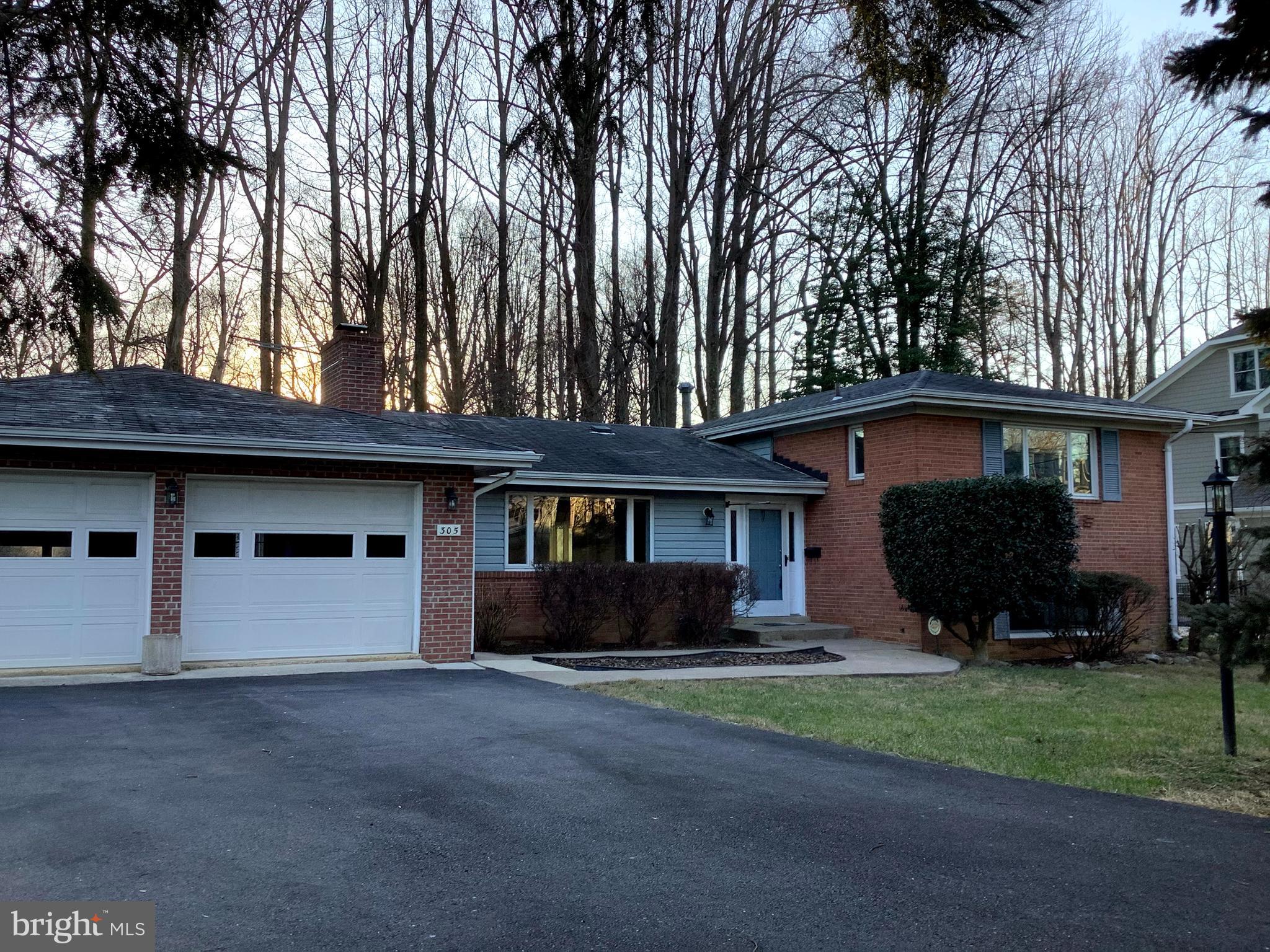 a house view with a garden space