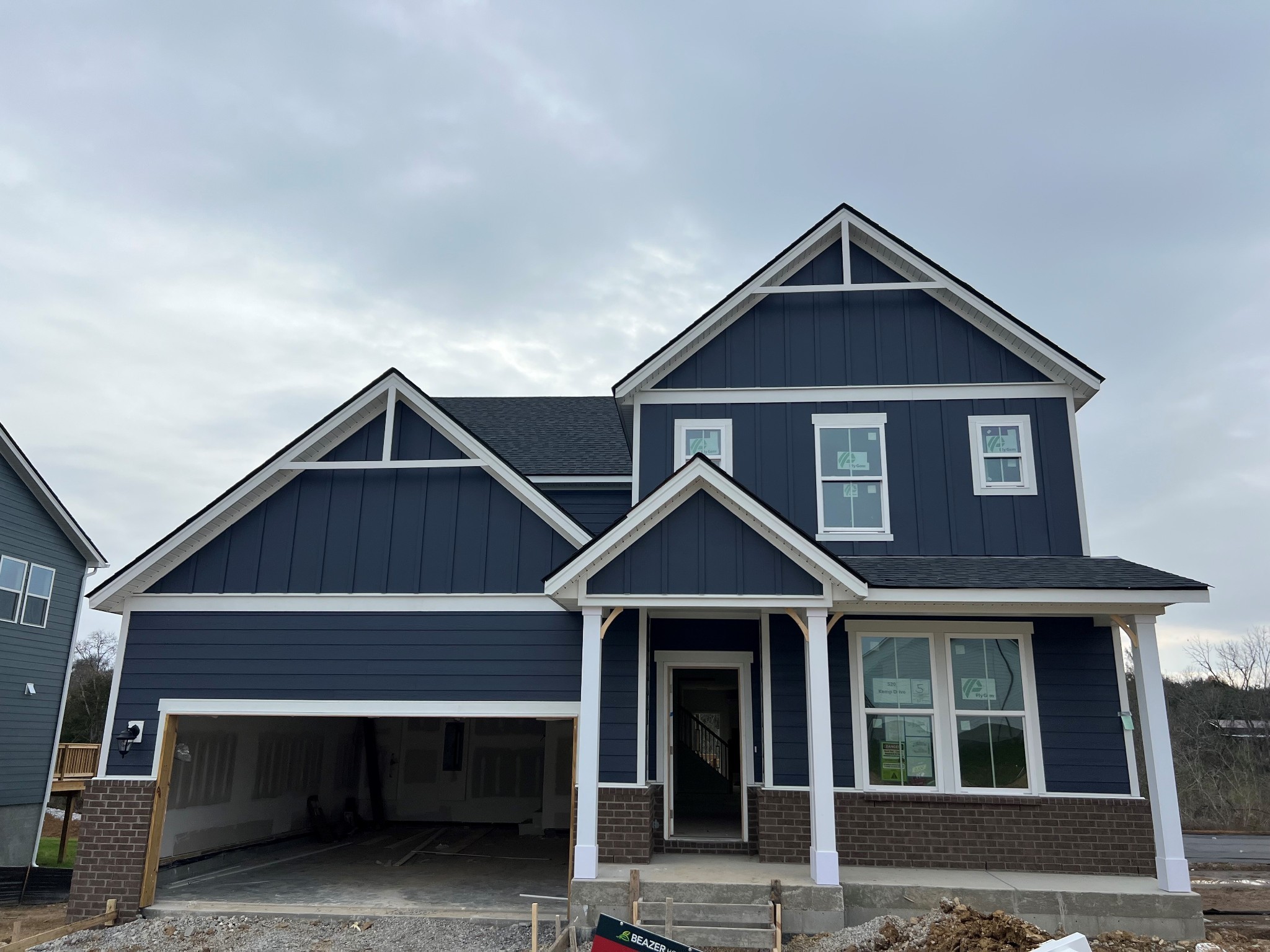 a front view of a house with yard