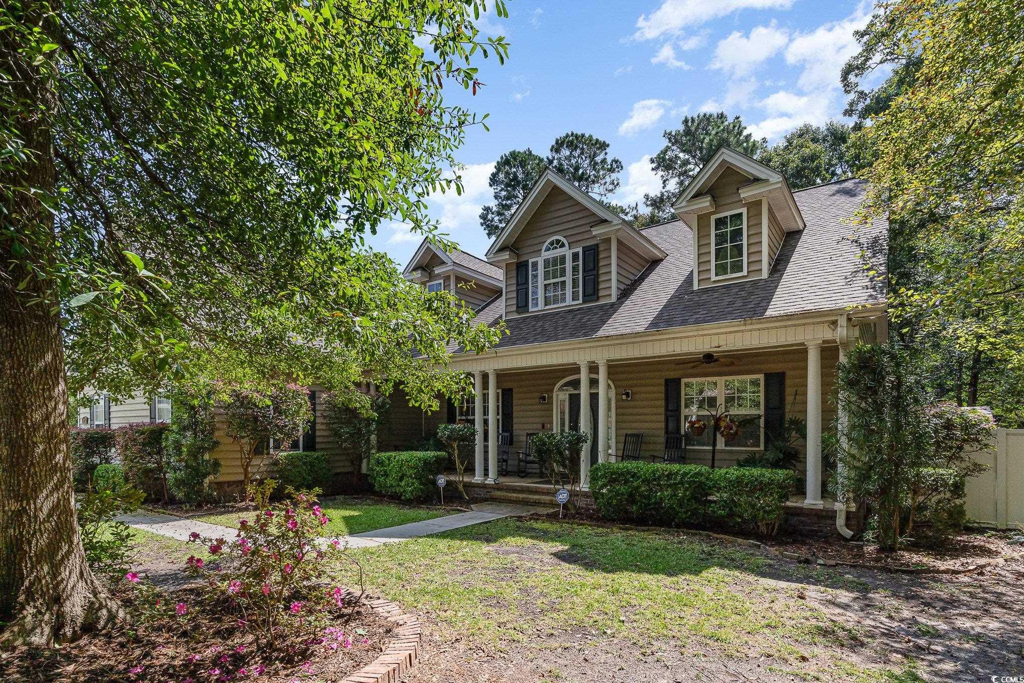 View of front of house featuring covered porch