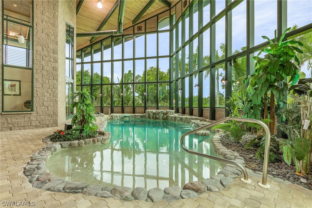 a view of swimming pool from a porch