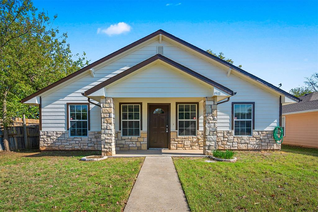 a front view of house with yard