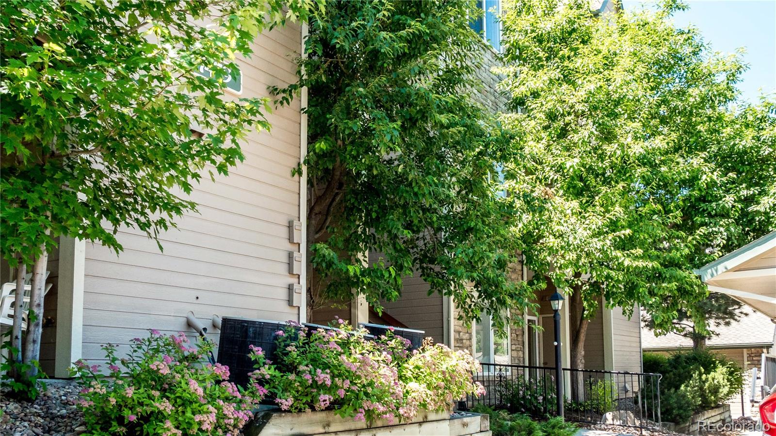 a view of a house with a tree