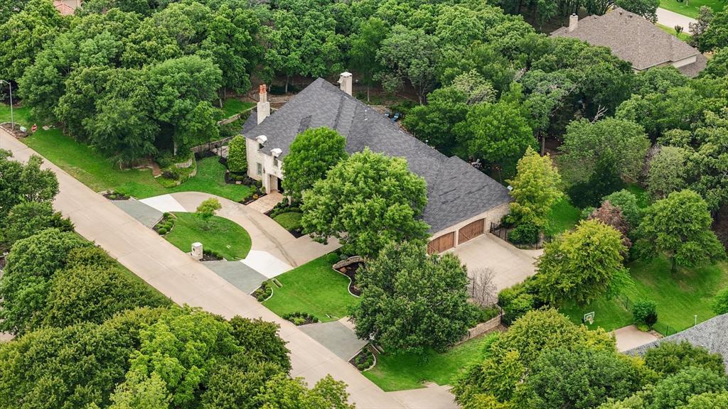 an aerial view of a house with garden