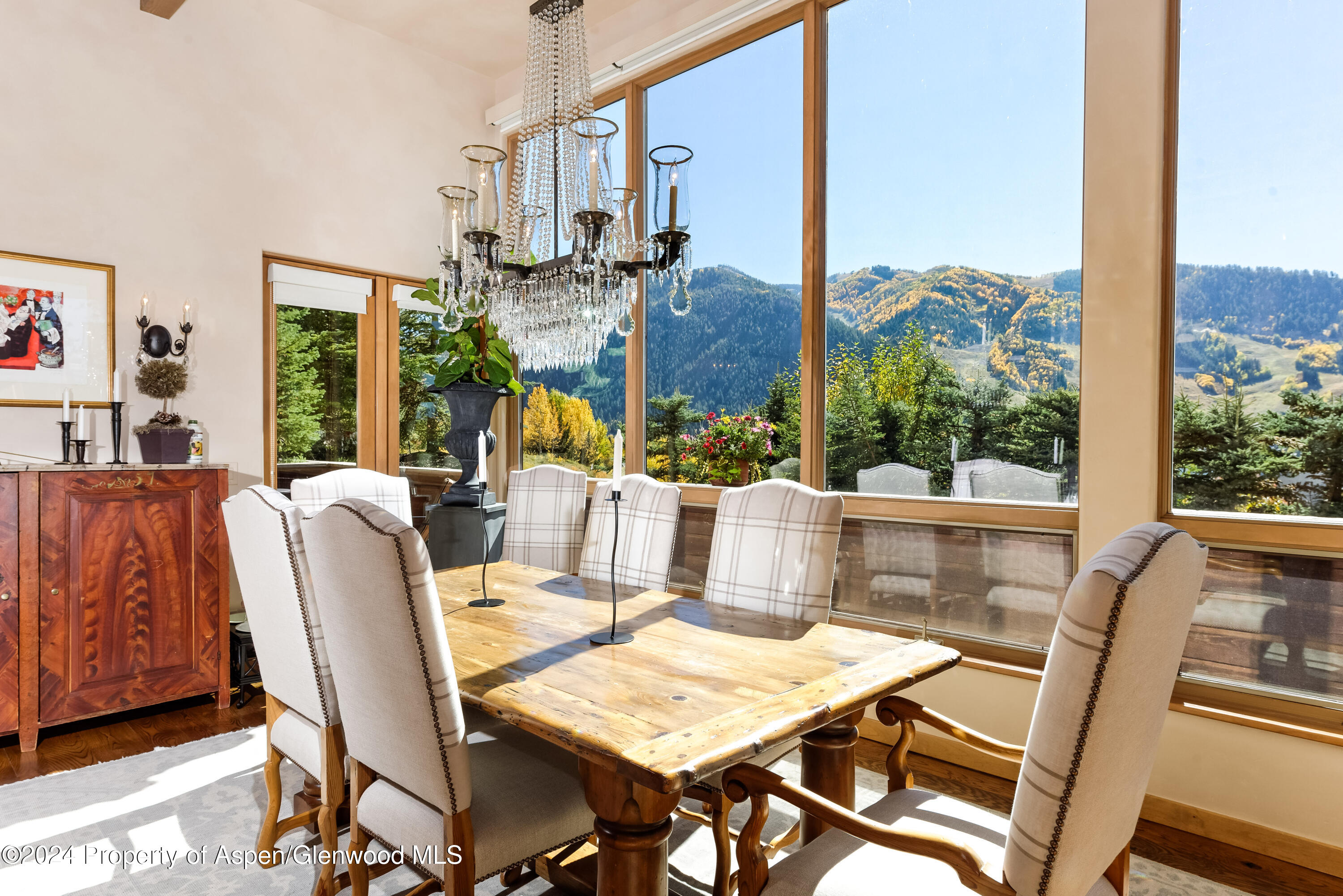 a view of a dining room with furniture window and outside view