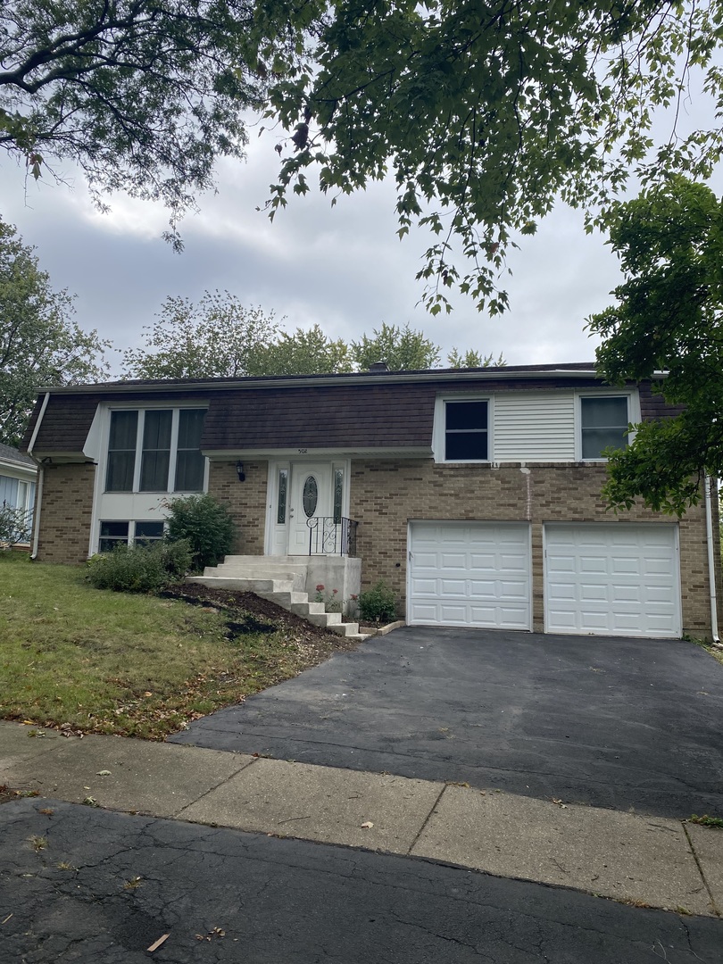 a front view of house with yard