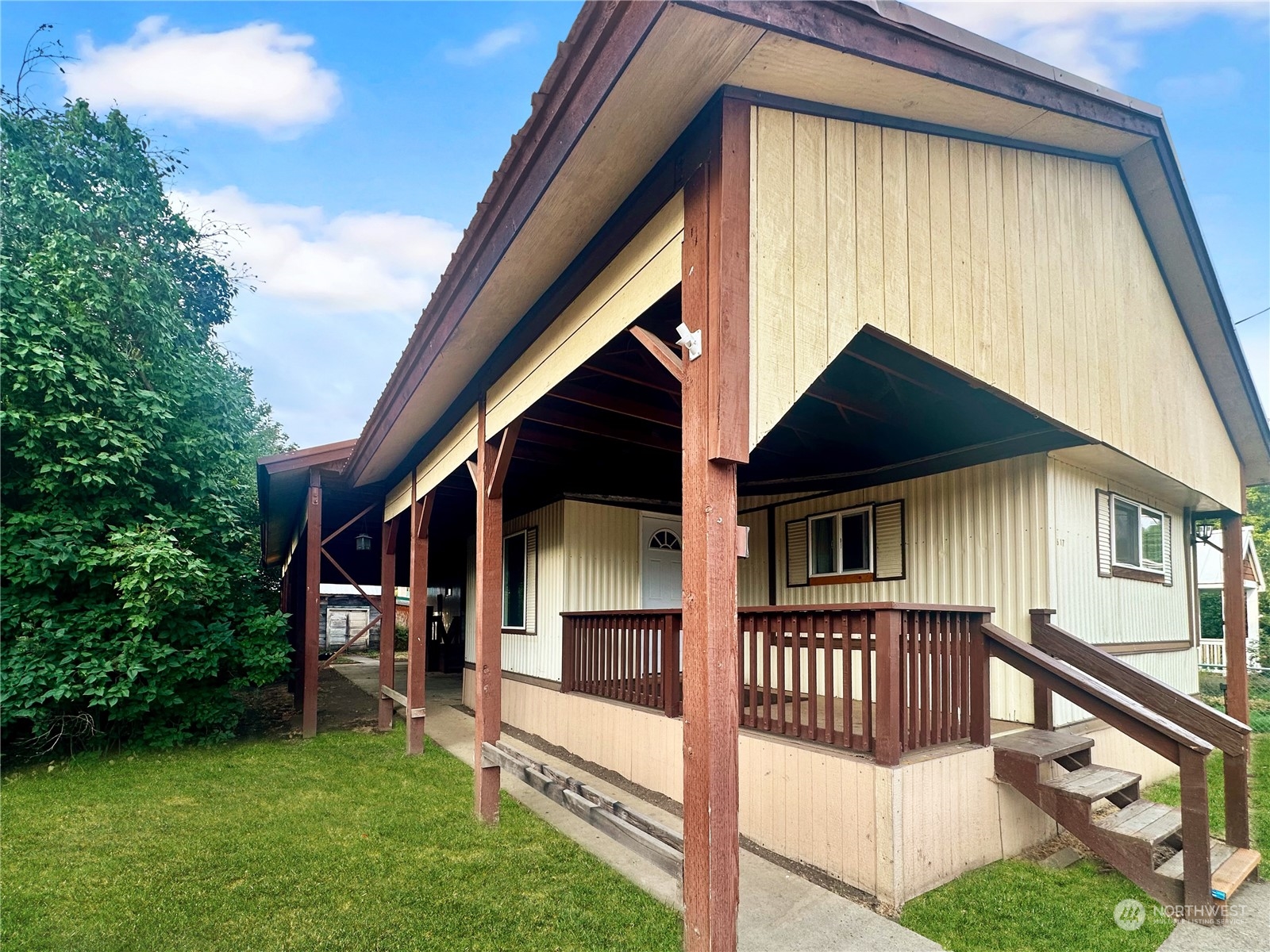 a view of backyard with deck