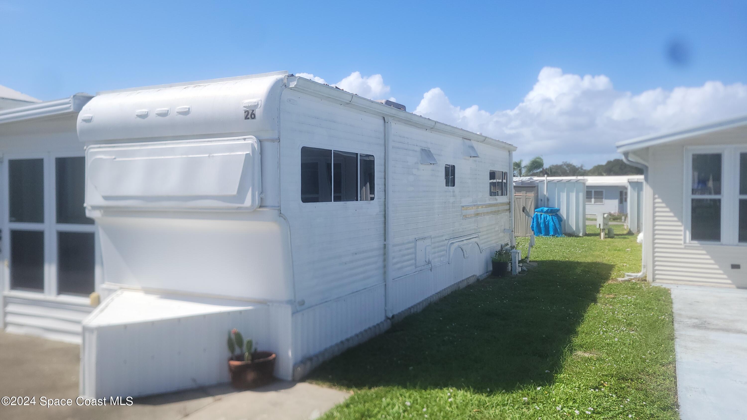 a view of a back yard of the house