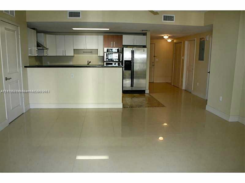 a view of a kitchen with kitchen and a sink